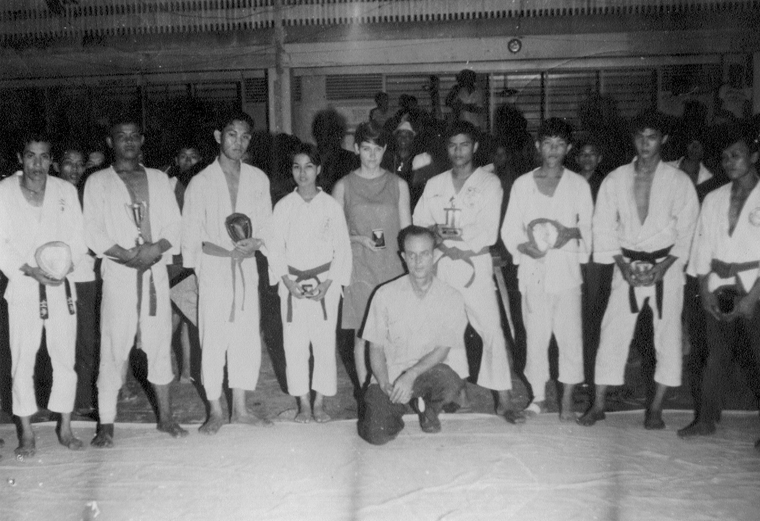 Mr. Bee with early class and tournament trophies